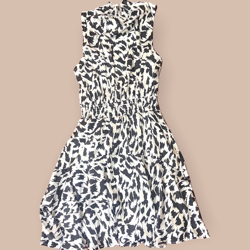 Sleeveless turtleneck midi dress